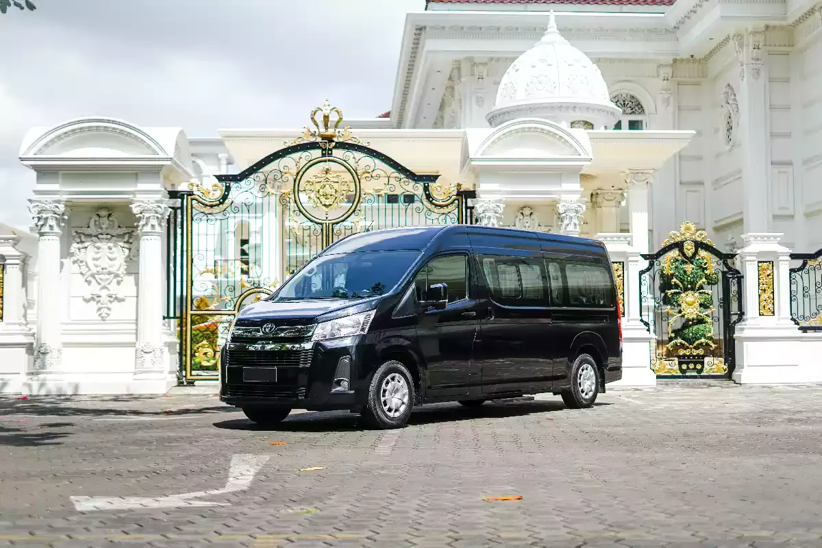 A black Toyota HiAce premium van