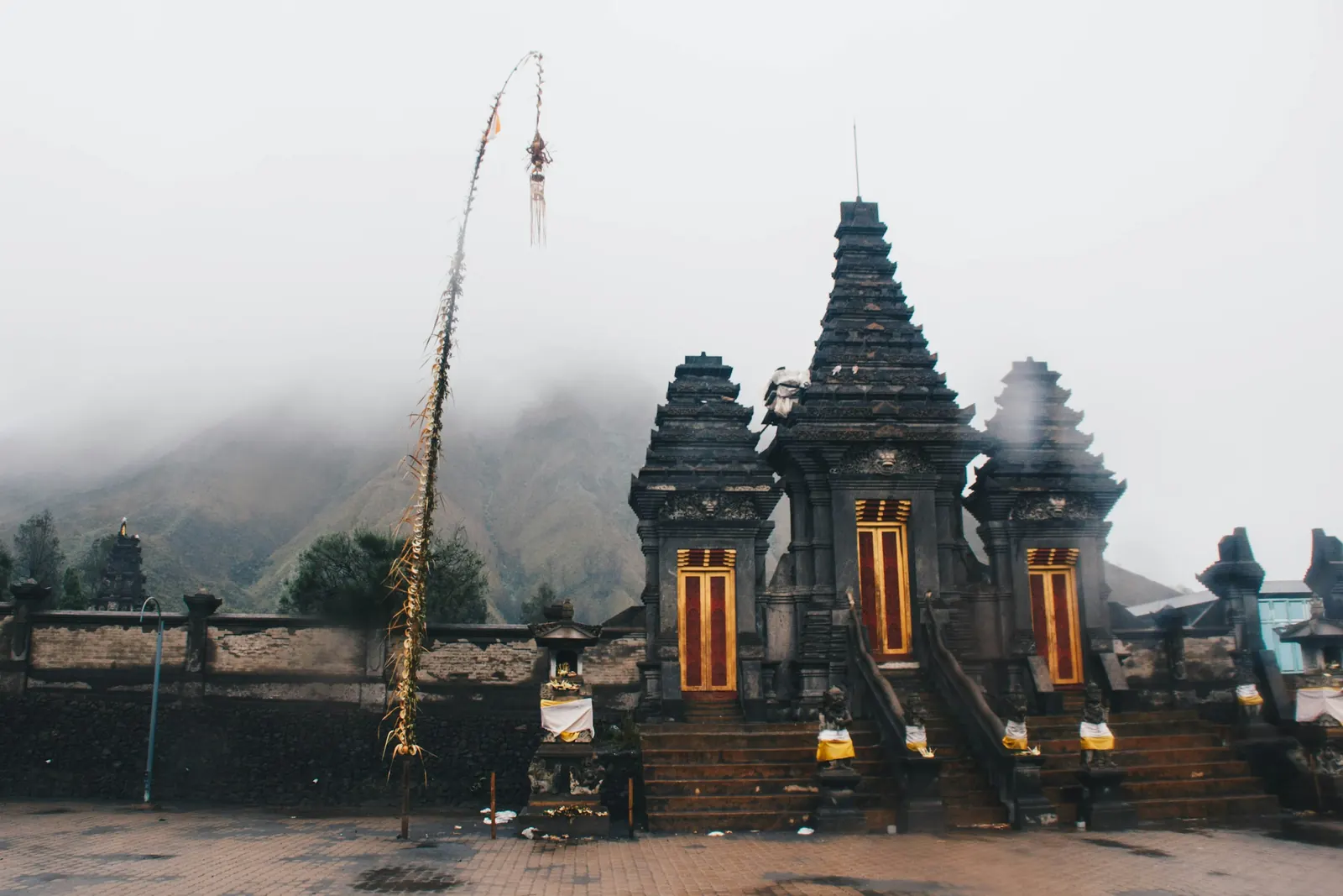 Pura Luhur Poten, the Tengger Hindu temple on the Bromo sea of sand, in fog